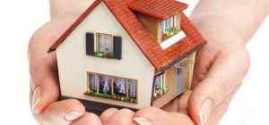 house-in-hand-shutterstock_8569744