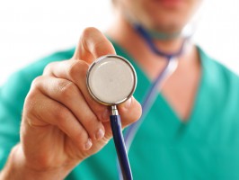 Doctor holding stethoscope